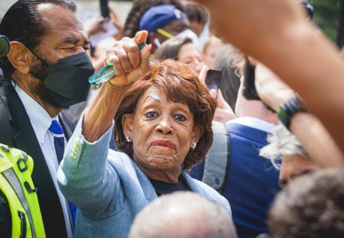 2171142965 featured image Maxine Waters Challenges Melania Trump's Status in Immigration Law Debate