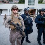 Trump Backs ICE Officer in Fatal Shooting Drama