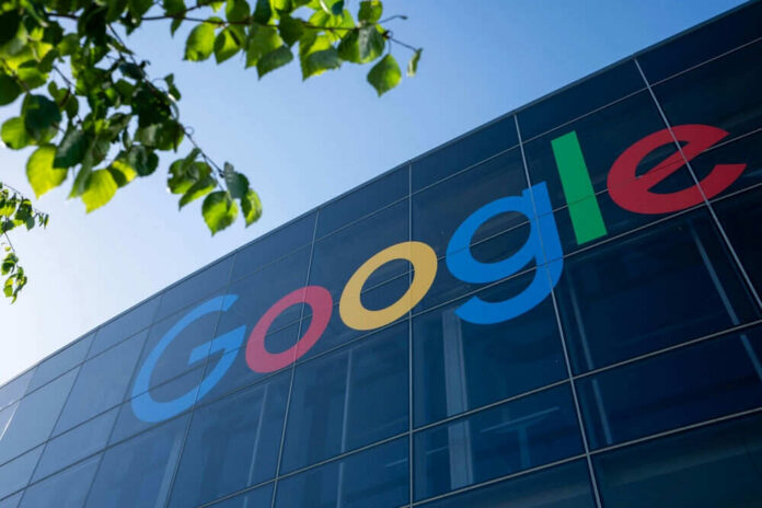 2523275931 Google logo on glass building exterior with leaves