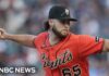 MLB warns players against writing Bible verses on their hats during Pride month