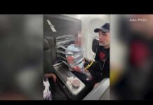 American Airlines passenger restrained with duct tape and handcuffs, plane makes emergency landing